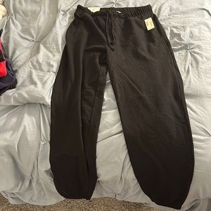 Black high rise, scrunched bottom sweatpants from Aéropostale. New, with tags.
